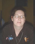 Debbie Fitzgerald Woman with dark hair and glasses